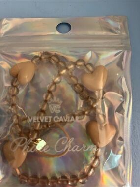 Velvet Caviar Tan Heart Phone Charm